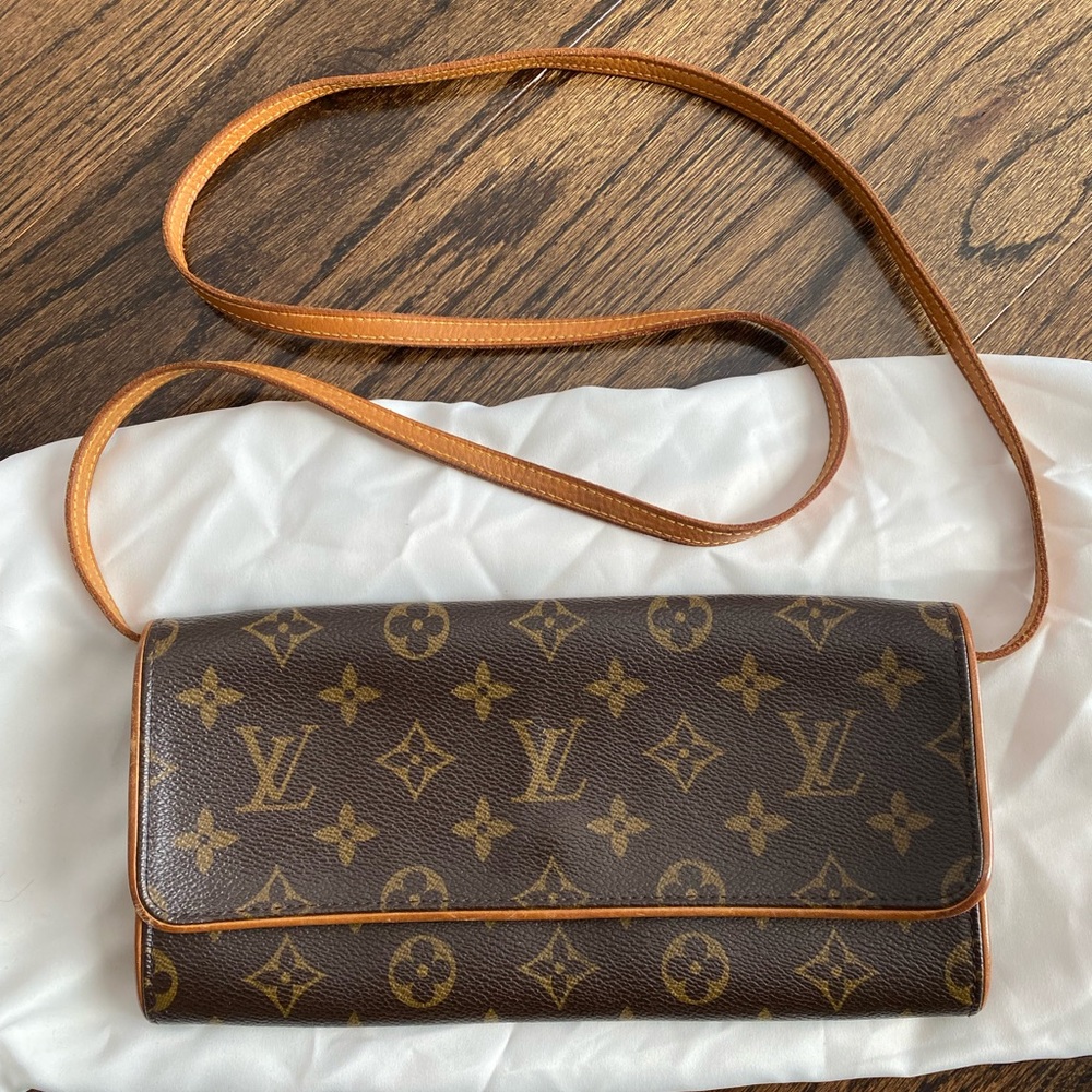 Louis Vuitton clutch/ belt bag/ crossbody bag